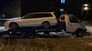 Эвакуация автомобиля зимой